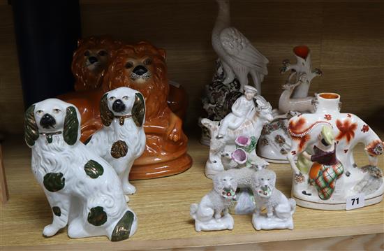 A collection of Victorian and later Staffordshire figures and animals